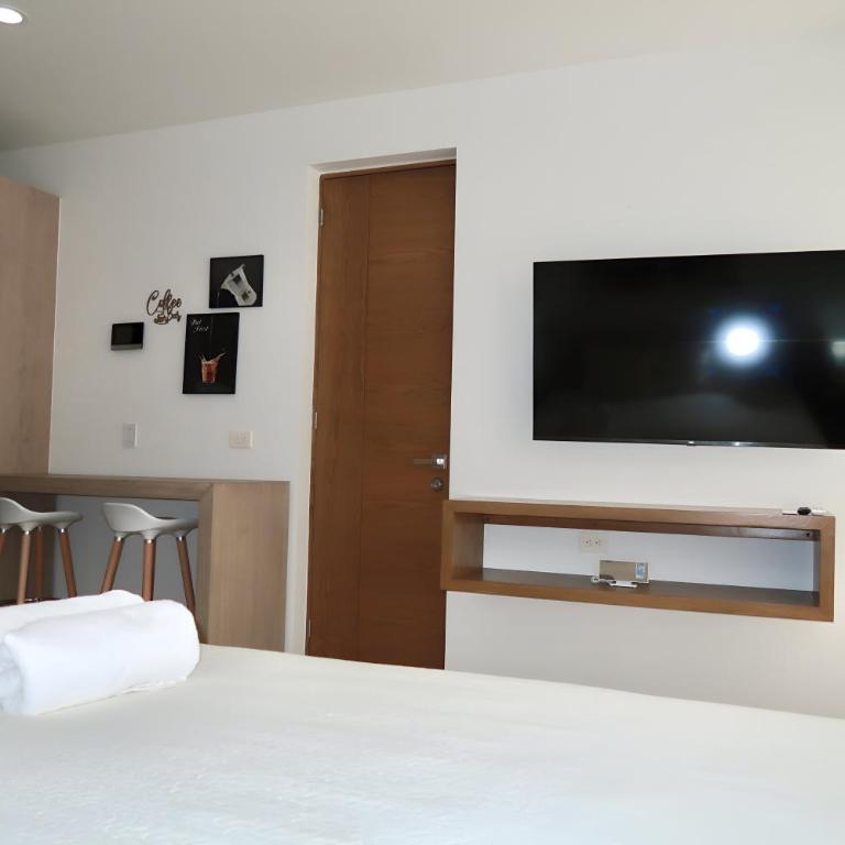 Modern Refuge Just Steps from 5th Avenue - Two-Bedroom Apartment with Balcony and Sea View - 37