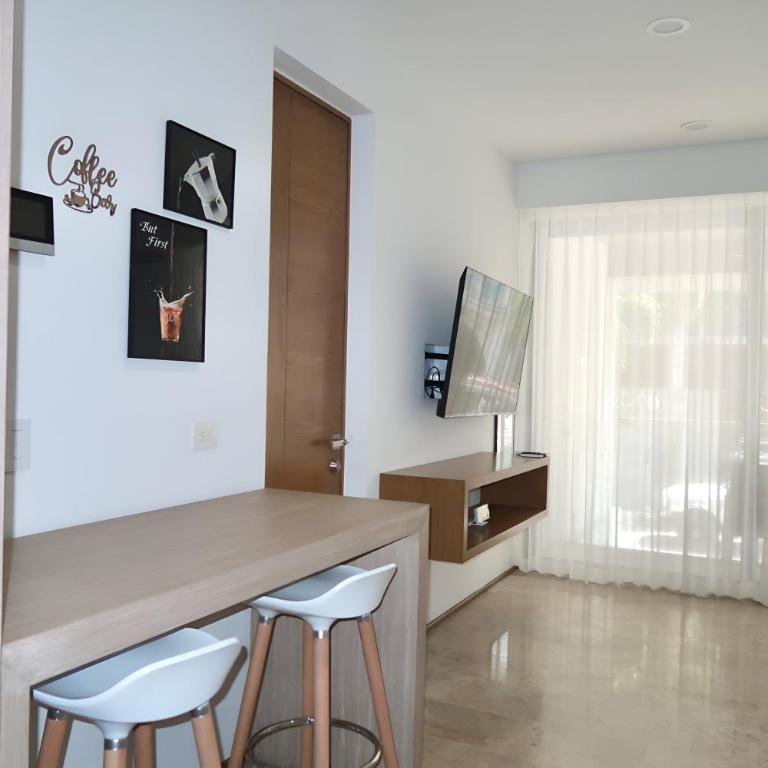 Modern Refuge Just Steps from 5th Avenue - Two-Bedroom Apartment with Balcony and Sea View - 34