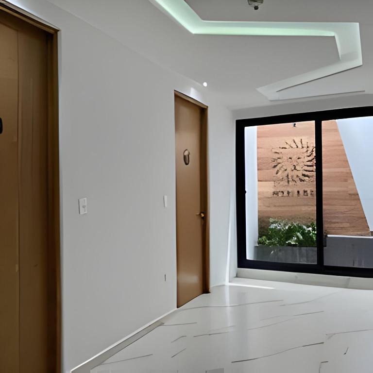 Modern Refuge Just Steps from 5th Avenue - Two-Bedroom Apartment with Balcony and Sea View - 42