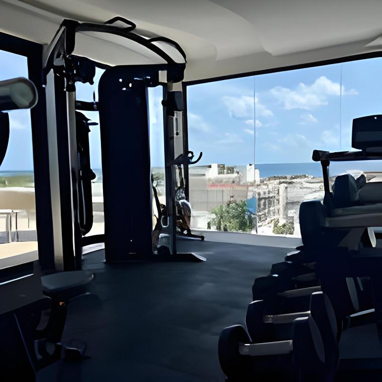 Modern Refuge Just Steps from 5th Avenue - Two-Bedroom Apartment with Balcony and Sea View - 44