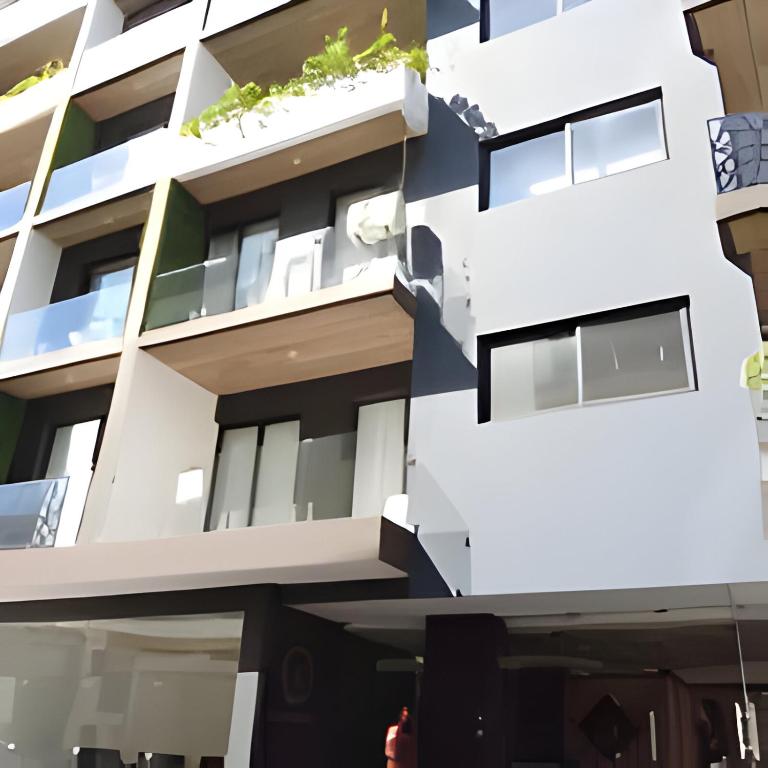 Modern Refuge Just Steps from 5th Avenue - Two-Bedroom Apartment with Balcony and Sea View - 45