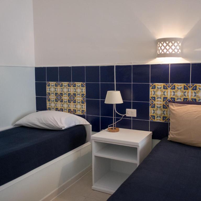 Residenza Punta Stendardo - Camera Tripla Classic - 7