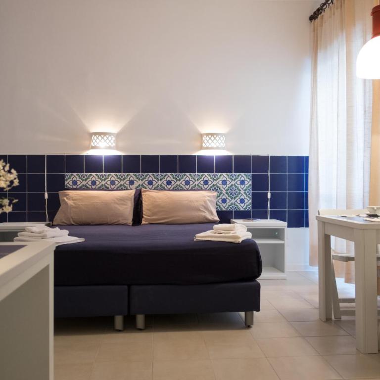 Residenza Punta Stendardo - Camera Tripla Classic - 10