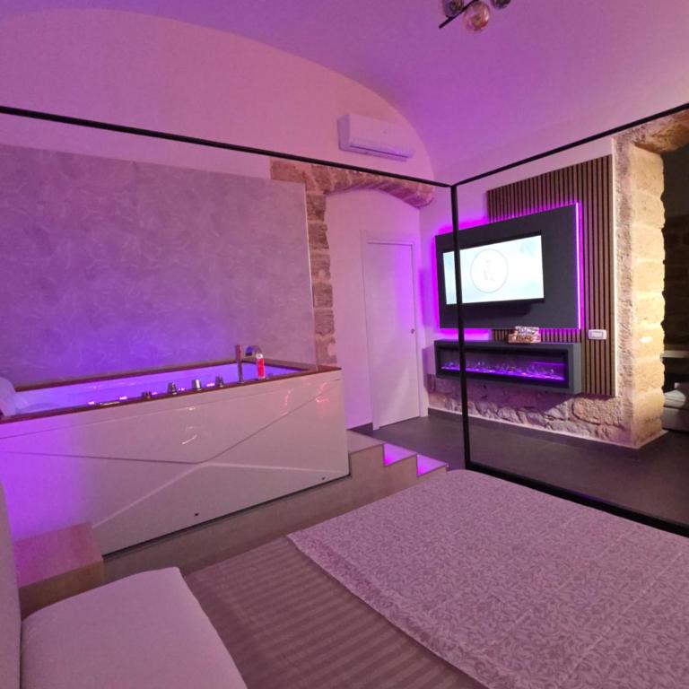 Thaleia Suite & Spa - Suite Deluxe con Vasca Idromassaggio - 7