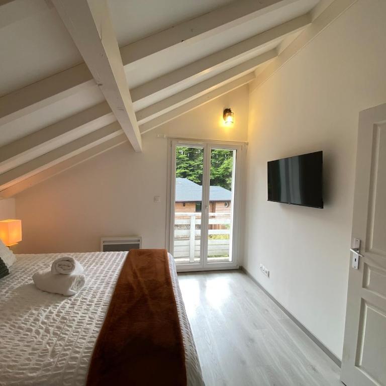 Chalet Vertpheny Spa & Terrasse à 500m du Lac de Gérardmer - Chalet - 24