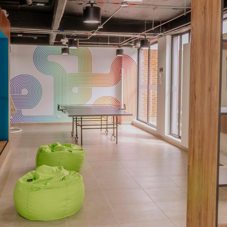 Moderno estudio con gimnasio, terraza y coworking en Bogotá - One-Bedroom Apartment - 42