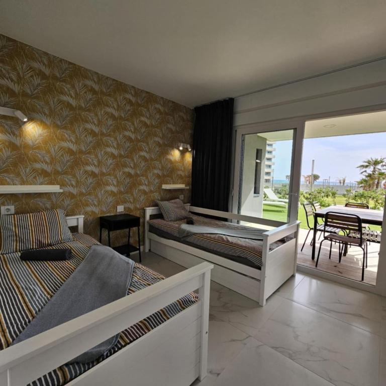 Posidonia Apartment, ground floor with garden,3 swimming pools, jacuzzi,parking space - Two-Bedroom Apartment - 7