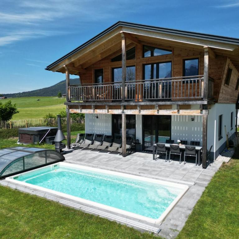 Chalet Bergherzerl im Chiemgau mit Sommerpool, Whirlpool, Sauna und eingezäuntem Garten - Chalet mit 3 Schlafzimmern - 6