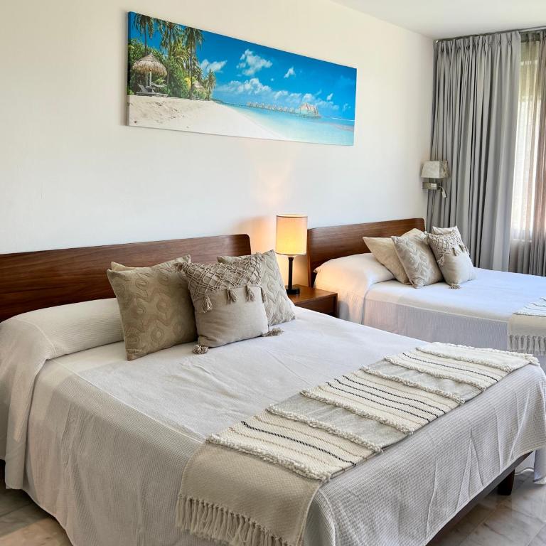 Luna, 2 Beds en la mejor ubicación de Cancún - Habitación Doble Deluxe - 2 camas dobles - 40