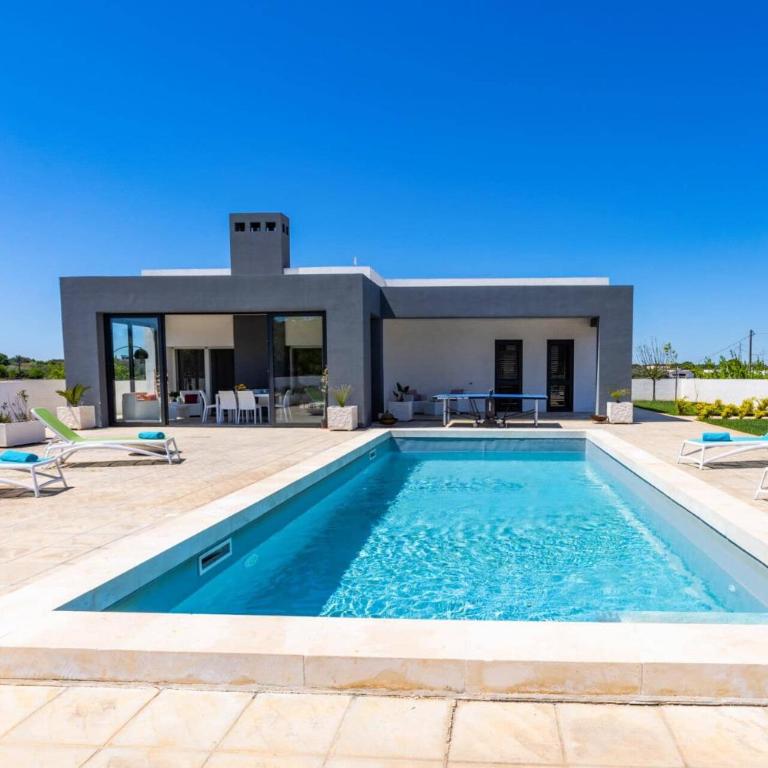 Villa La Corte Bianca by Villa Plus - Villa - 1