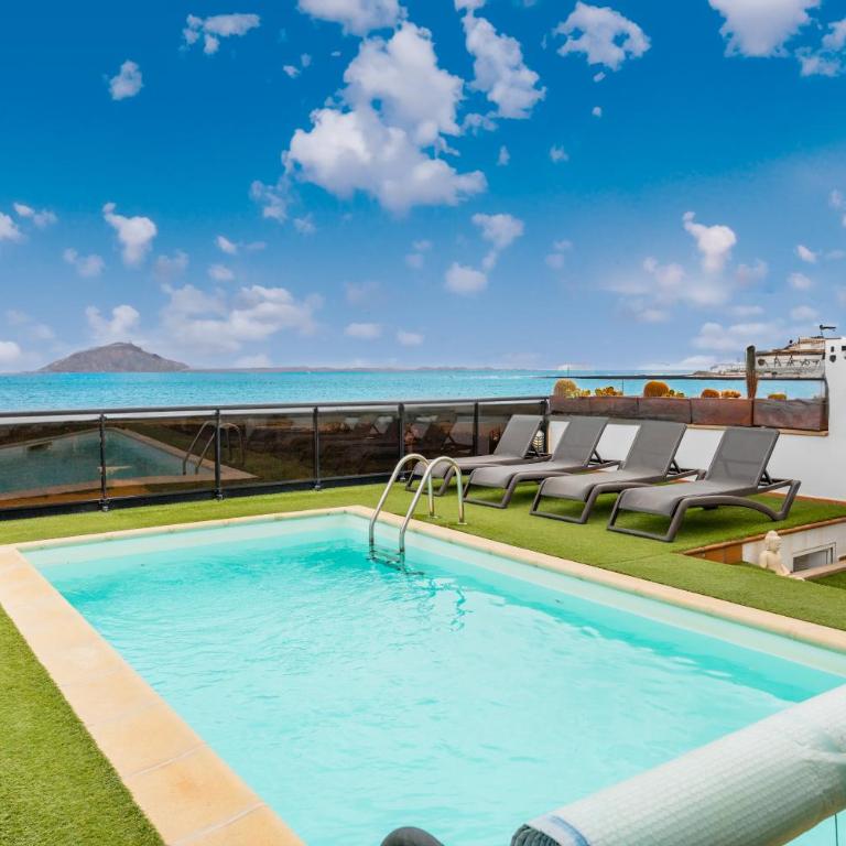 Villa Oasis Beachfront Corralejo By Holidays Home - Three-Bedroom Villa - 1
