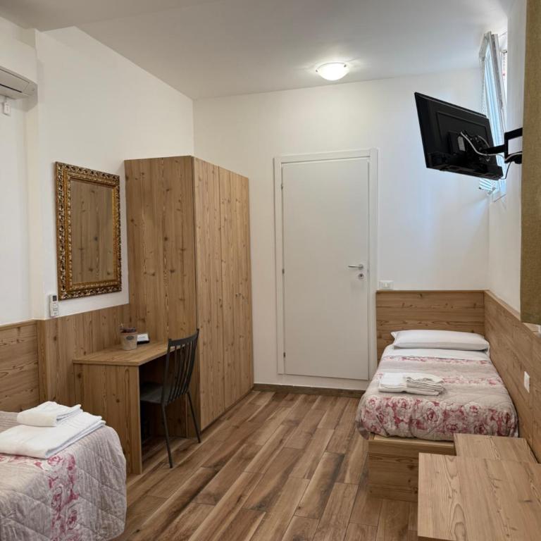 Pirandello Rooms - Camera Deluxe Doppia con Letti Singoli - 5