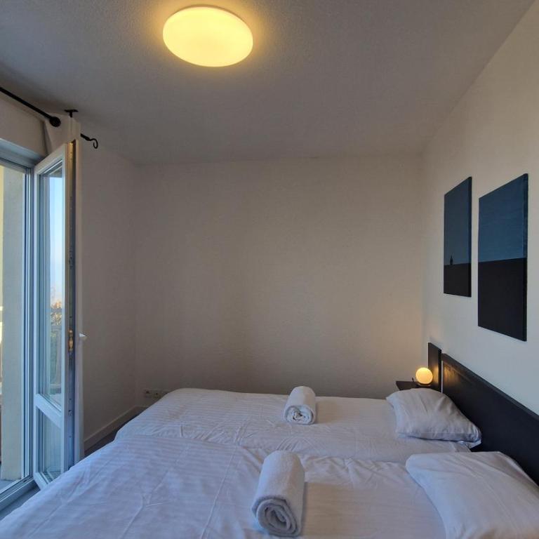 Appartement avec piscine Bleu du Lac - Appartement 2 Chambres - Vue sur Lac - 28
