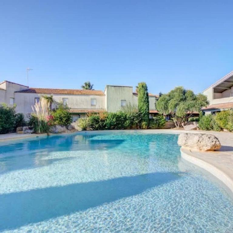Pavillon pour 4 personnes dans une résidence avec piscine - Maison de Vacances - 1
