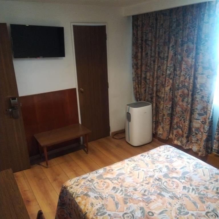 Hotel Sevilla - Habitación Estándar - 1 cama grande - 2