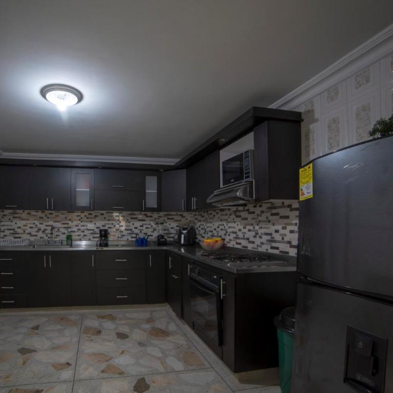 Your home away from home - Three-Bedroom Apartment with Balcony - 26