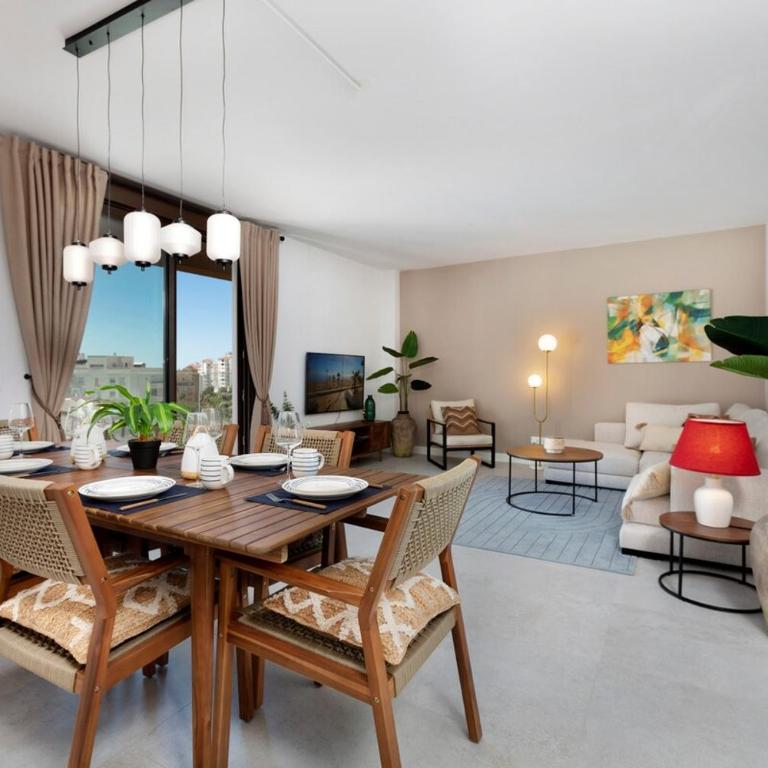 Modern 4-Person Apartment with Pool & Indoor Parking - Two-Bedroom Apartment with Garden View - 2