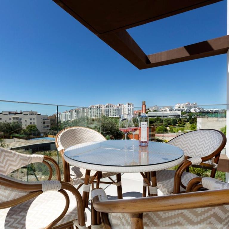 Modern 4-Person Apartment with Pool & Indoor Parking - Two-Bedroom Apartment with Garden View - 4