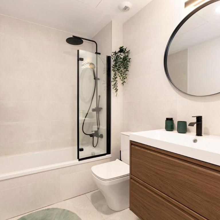 Modern 4-Person Apartment with Pool & Indoor Parking - Two-Bedroom Apartment with Garden View - 11
