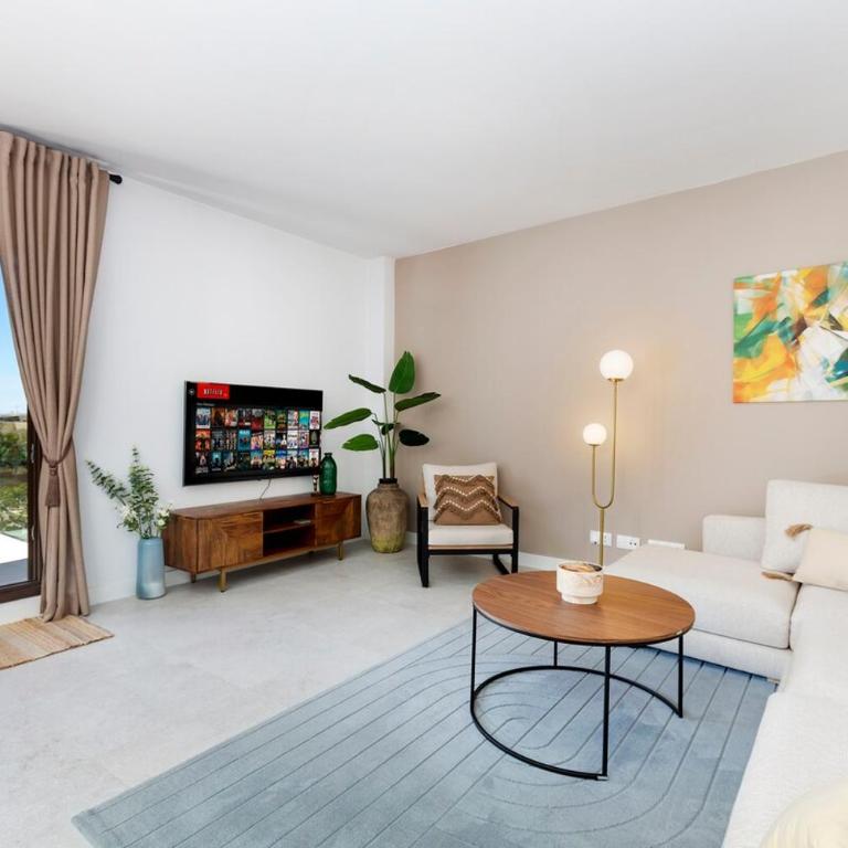 Modern 4-Person Apartment with Pool & Indoor Parking - Two-Bedroom Apartment with Garden View - 13