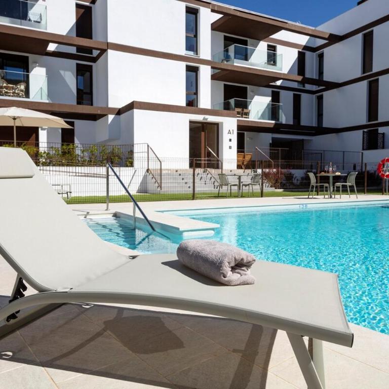 Modern 4-Person Apartment with Pool & Indoor Parking - Two-Bedroom Apartment with Garden View - 20