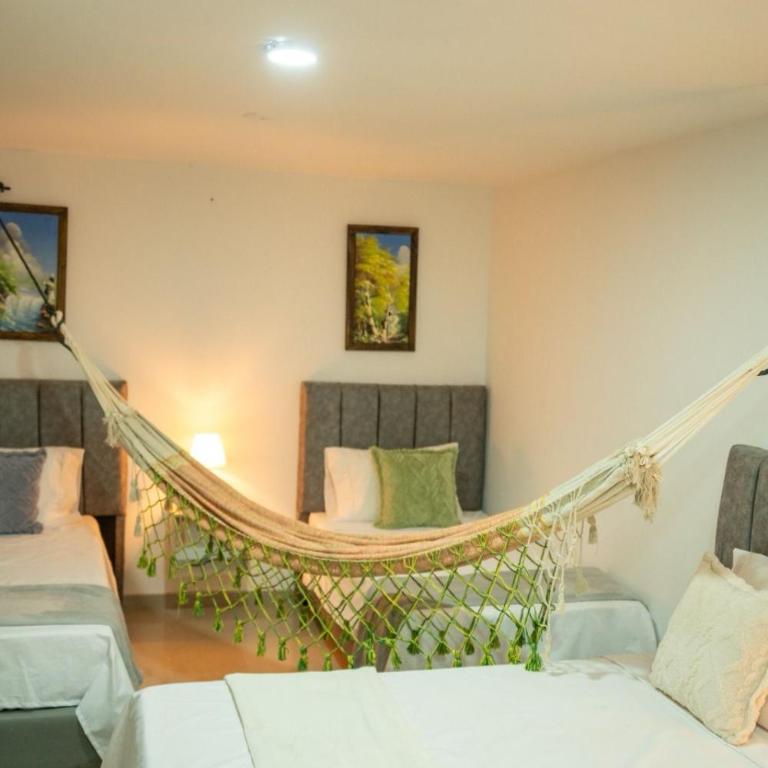 La Malena, Casa Hotel - Habitación Triple Confort con ducha - 1