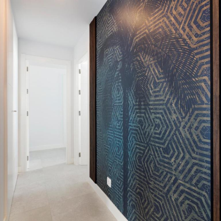 Modern 4-Person Apartment with Pool & Indoor Parking - Two-Bedroom Apartment with Garden View - 17
