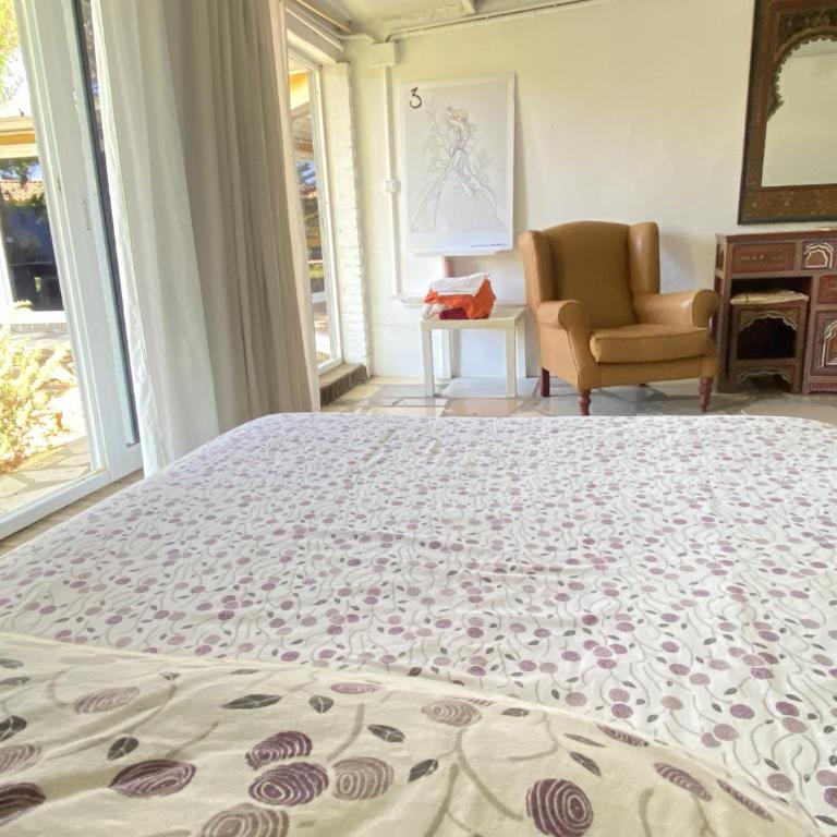 Jacaranda - Habitación con cama extragrande y vistas al jardín - 22