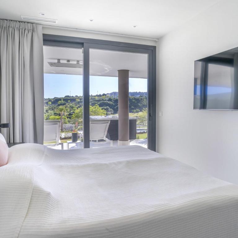 Fabuloso apartamento con jardín privado y jacuzzi. - Apartamento con vistas a la piscina - 40
