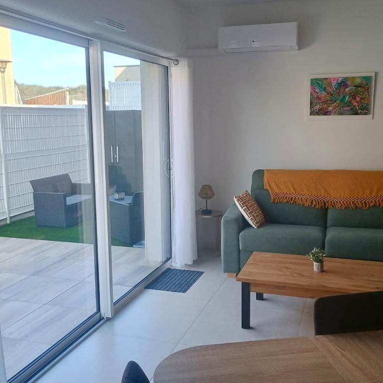 AYAPI - Appartement neuf 3 étoiles avec terrasse et jardin - bord de plage - Appartement 1 Chambre - Vue sur Jardin - 11