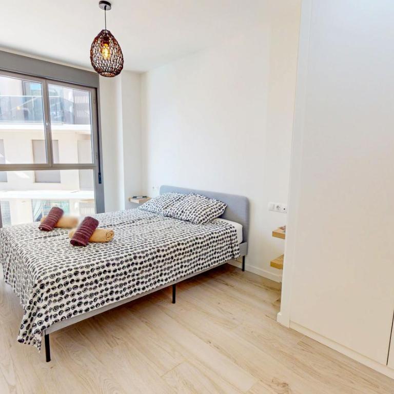 Apartamento Tulipán en Dénia Urb Marina Real III Terraza, varias piscinas y gimnasio cerca de la playa Las Rotas - Apartamento de 2 dormitorios con vistas a la piscina - 10