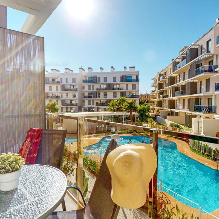 Apartamento Tulipán en Dénia Urb Marina Real III Terraza, varias piscinas y gimnasio cerca de la playa Las Rotas - Apartamento de 2 dormitorios con vistas a la piscina - 6