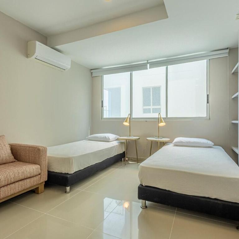 Luxurious Beachfront 3BR, Pool & Ocean Views - Three-Bedroom Apartment - 4