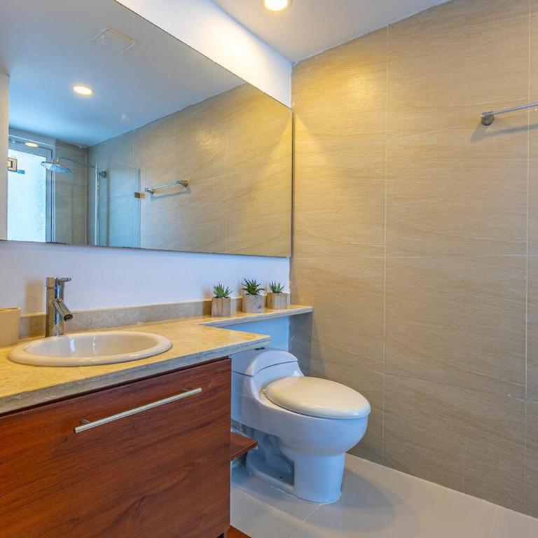 Luxurious Beachfront 3BR, Pool & Ocean Views - Three-Bedroom Apartment - 14