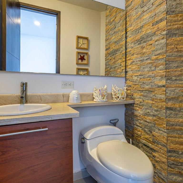 Luxurious Beachfront 3BR, Pool & Ocean Views - Three-Bedroom Apartment - 17