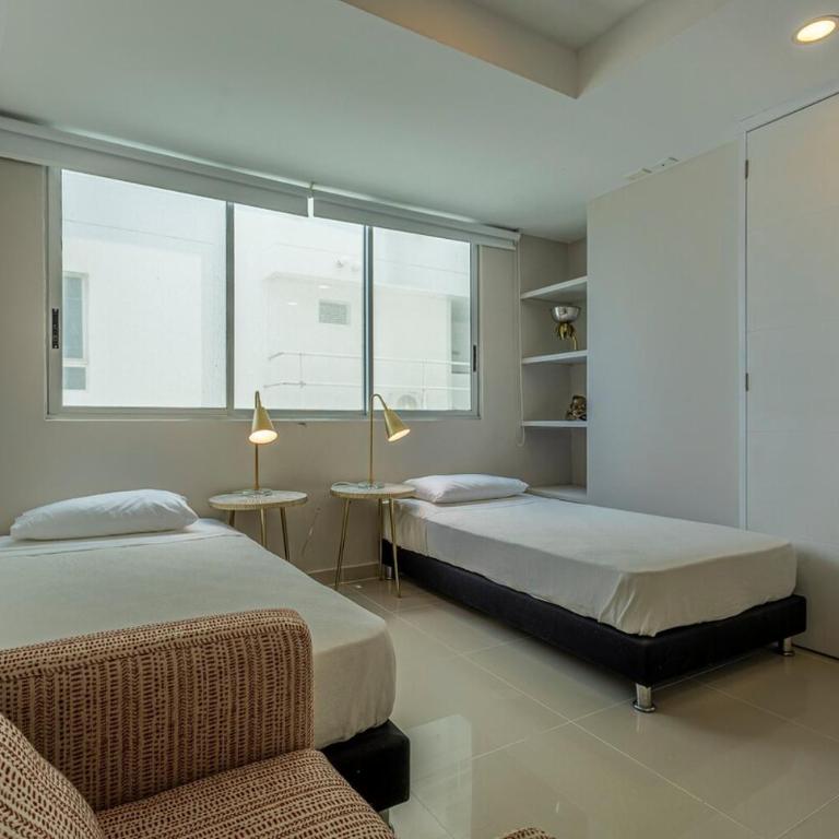 Luxurious Beachfront 3BR, Pool & Ocean Views - Three-Bedroom Apartment - 23