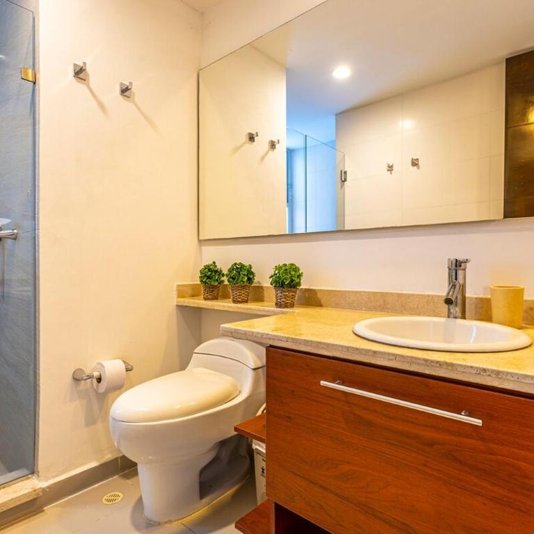 Luxurious Beachfront 3BR, Pool & Ocean Views - Three-Bedroom Apartment - 27