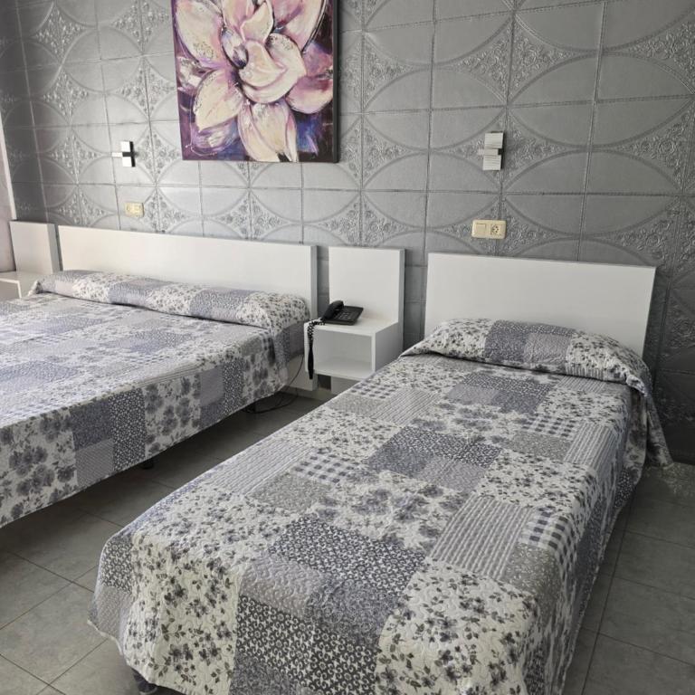 Ampuria Inn - Habitación Triple - 4