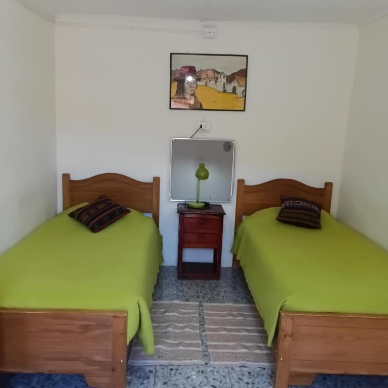 Hostal Sonchek - Habitación Doble con baño privado - 2 camas - 5