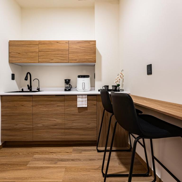 Suites Monterrey by Escajal Rooms - Habitación Deluxe - 1 cama grande - 10