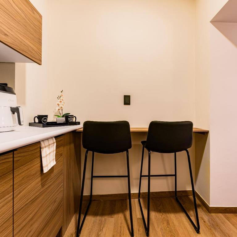 Suites Monterrey by Escajal Rooms - Habitación Deluxe - 1 cama grande - 5