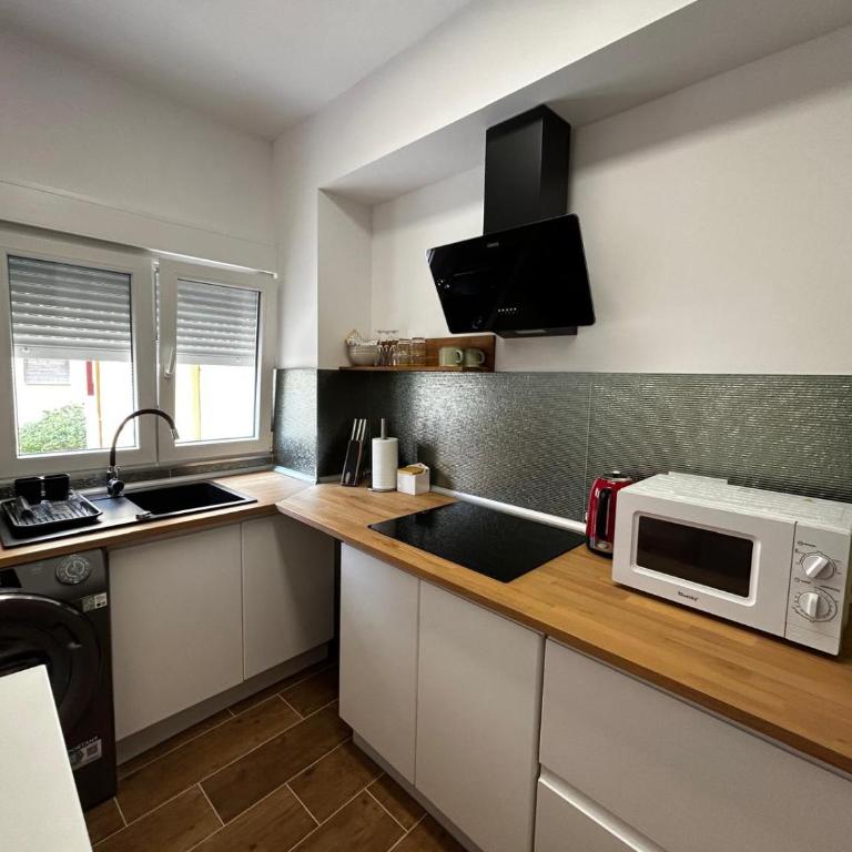 Menorca 100 m de Playa de Gandia 3 personas parking ascensor - Apartamento de 1 dormitorio - 53