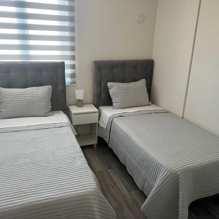 DEPARTAMANTO NUEVO EN CHILLÁN, ESTACIONAMIENTO Y AIRE ACONDICIONADO a - Apartamento de 3 dormitorios - 7
