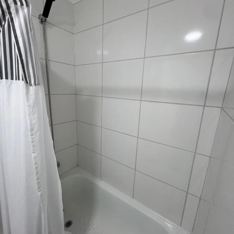 DEPARTAMANTO NUEVO EN CHILLÁN, ESTACIONAMIENTO Y AIRE ACONDICIONADO a - Three-Bedroom Apartment - 10