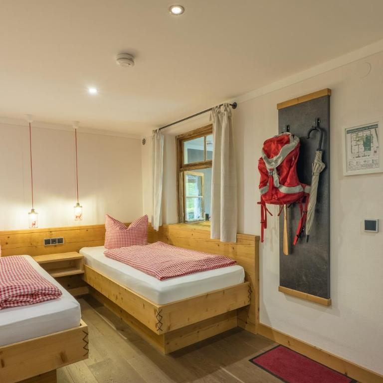 Dreimäderlhaus - Das vegetarische Boutique Hotel - Premium Familienzimmer mit Seeblick - 7