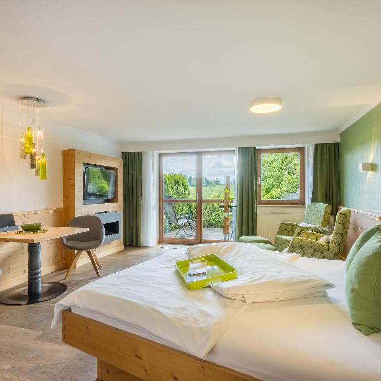 Dreimäderlhaus - Das vegetarische Boutique Hotel - Premium Familienzimmer mit Seeblick - 1