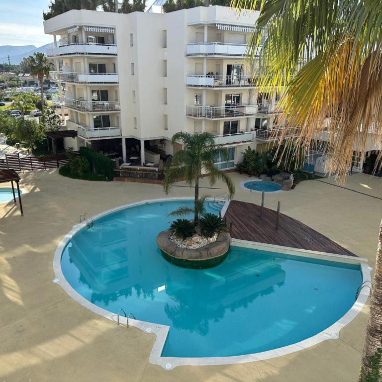 Bonito piso en Roses con piscina y parking AV-66 - Two-Bedroom Apartment - 9