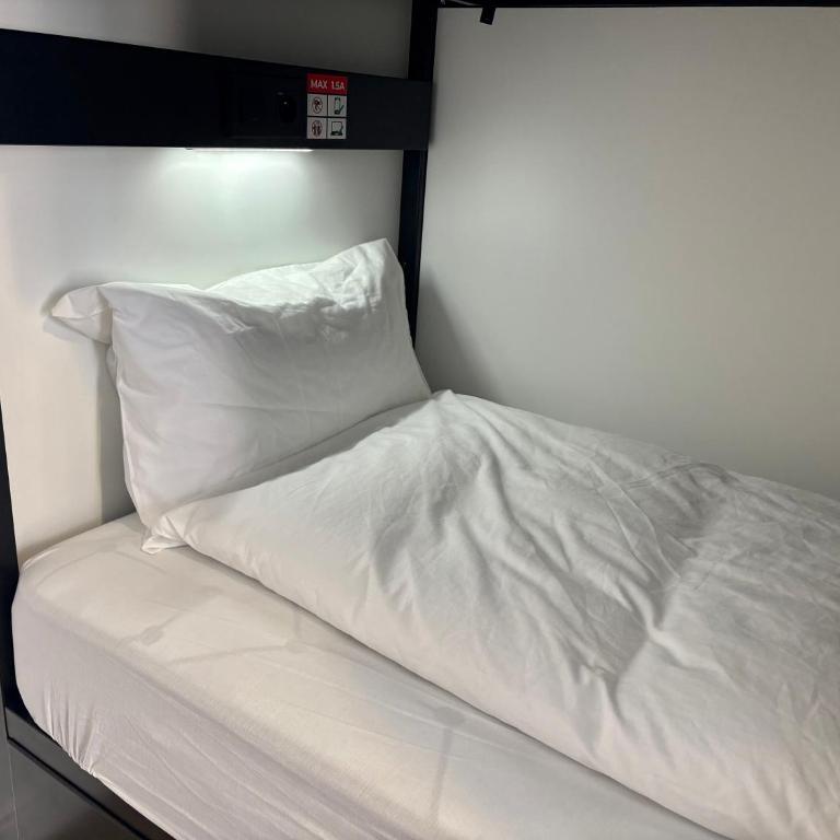 Lourdes Backpackers - Cama individual en dormitorio compartido femenino de 2 camas - 9