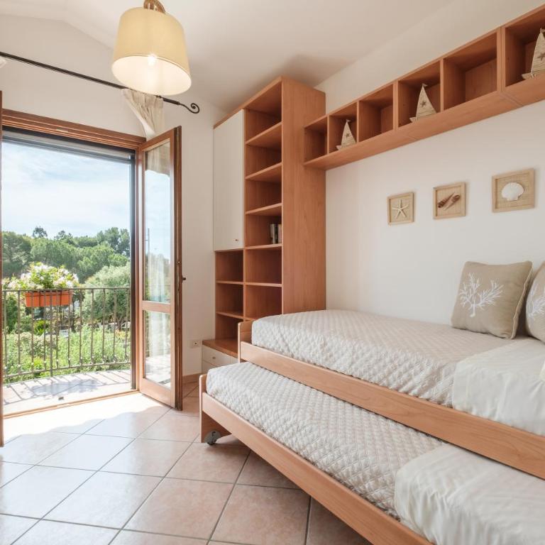 Mare e Centro 5 min auto - con Wi-fi, Netflix e A-C - Casa con 2 Camere da Letto - 5