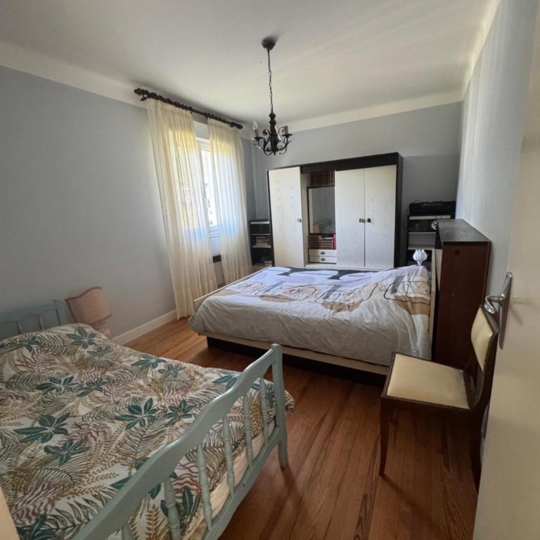 Chambre chez Paulette - Chambre Triple - Vue sur Jardin - 2